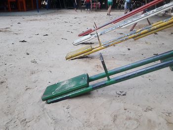 High angle view of deck chairs on sand