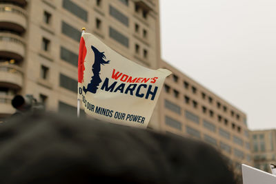 Low angle view of flag against sky