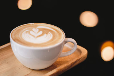 Close-up of cappuccino on table