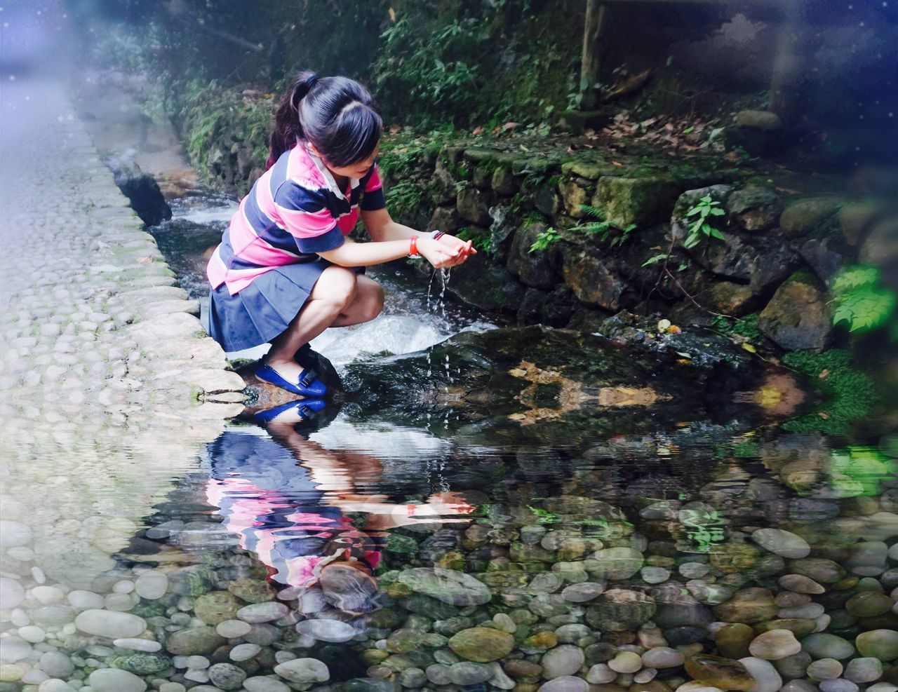 FULL LENGTH OF CHILD ON WATER