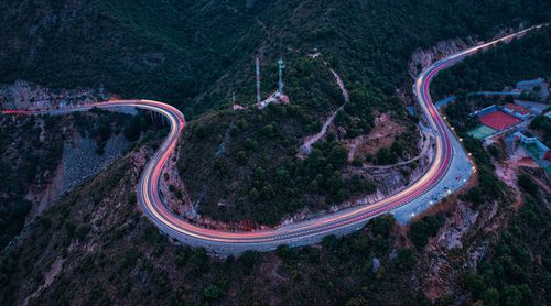 Aerial view of winding road at dusk