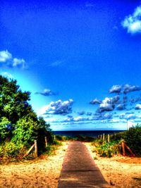 Scenic view of landscape against cloudy sky