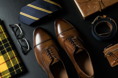 High angle view of personal accessories on table