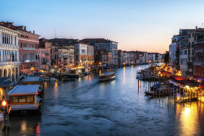 Grand canal at sunset viewed over the rialto bridge, venice, italy