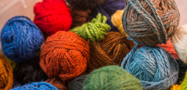 Colorful balls of woolen yarn