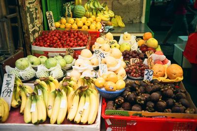 High angle view of various fruits at market for sale