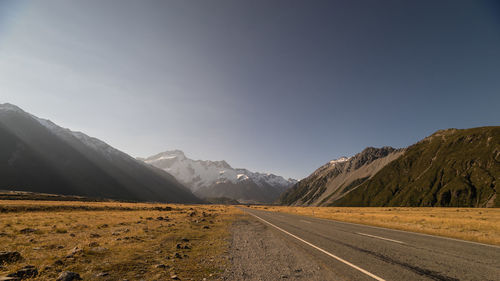 Road leading towards mountains