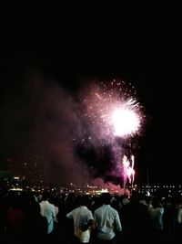 Firework display at night