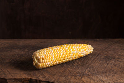 Close-up of corn on table