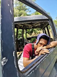 Portrait of man in car