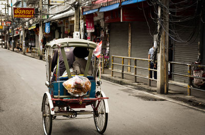 Man cycling on street