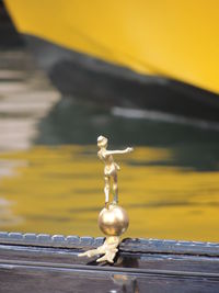 Close-up of yellow water against blurred background