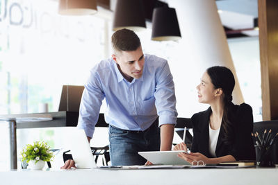 Business colleagues working at office