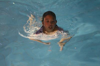 High angle portrait of boy in water