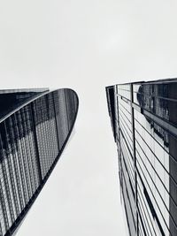 Low angle view of modern buildings against clear sky