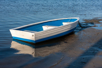 High angle view of ship moored on beach