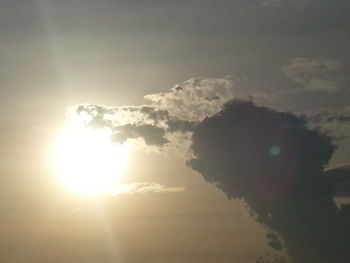 Sun shining through clouds