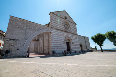 View of historical building against clear blue sky