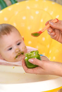 High angle view of boy eating food