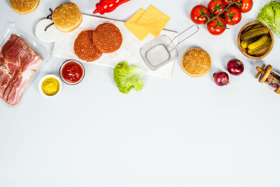 Close-up of burgers on serving board