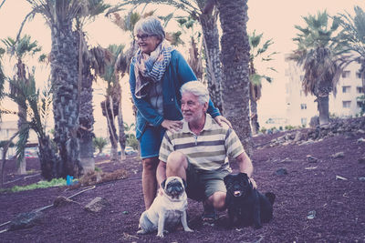 Senior couple with dogs