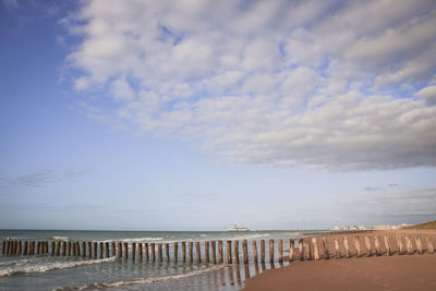 Scenic view of beach against sky