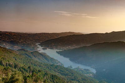 Scenic view of mountains against sky during sunset