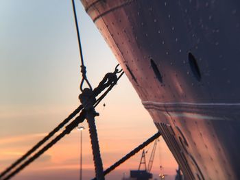 Low angle view of ship during sunset