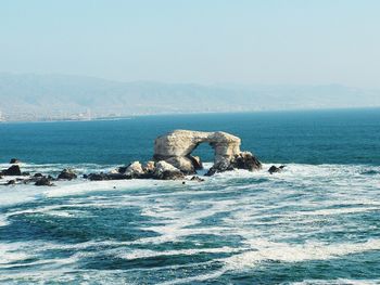 Scenic view of sea against clear sky