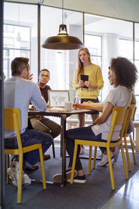 Business people brainstorming in board room at office