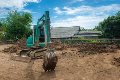 View of construction site on field against sky