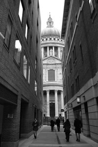 People in front of building