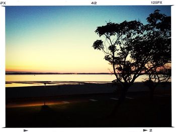 Scenic view of sea at sunset