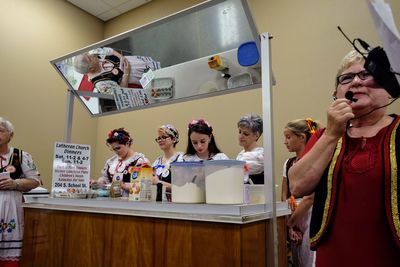 People standing on table