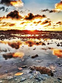 Scenic view of sea against sky during sunset