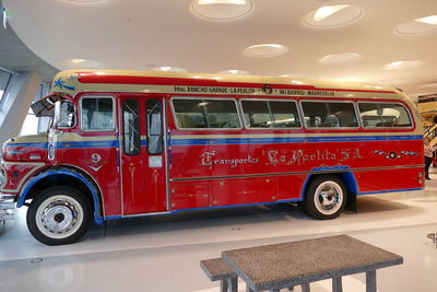 Red vintage car in city