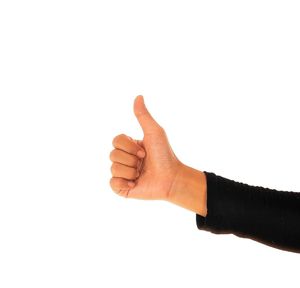 Close-up of human hand against white background