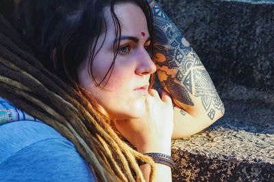 Portrait of young woman lying down