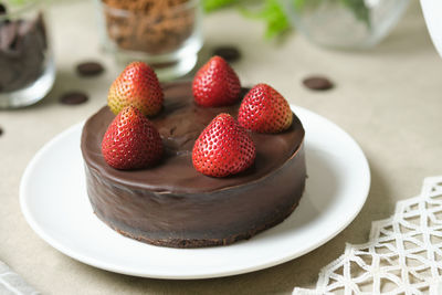 Close-up of strawberries in plate on table