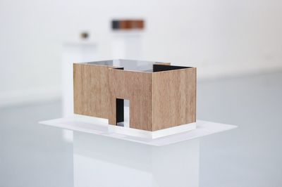 Close-up of model home on table