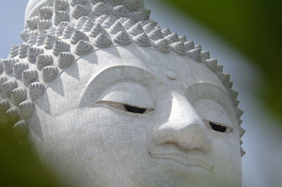 Close-up of statue against temple