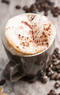 High angle view of frothy drink on table