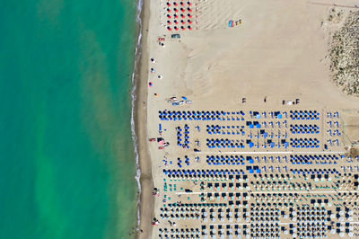 High angle view of text on beach