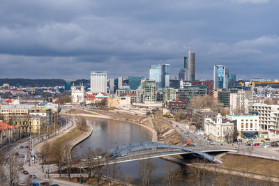 High angle view of bridge and buildings against sky