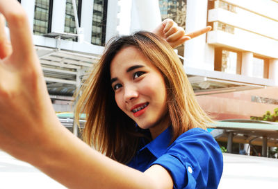 Portrait of smiling young woman