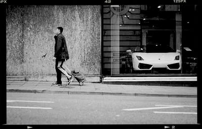 Full length of woman walking on road