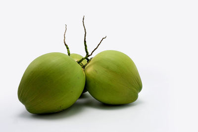 Close-up of fruits against white background