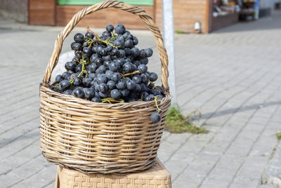 Close-up of fruits in basket on street