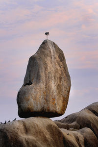 Scenic view of rock against sky