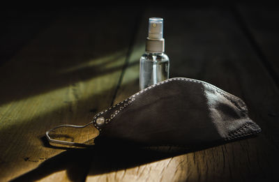 Close-up of glass bottle on table